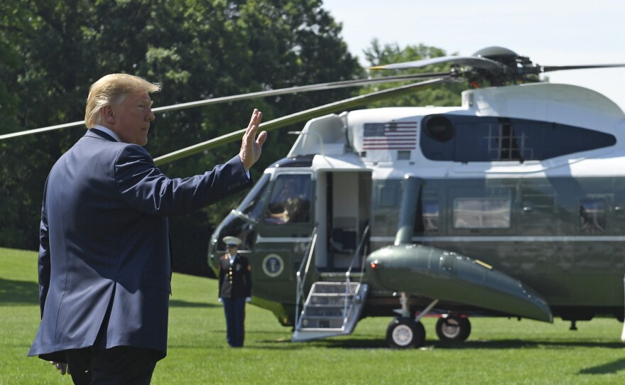 President Trump called off planned nationwide immigration raids Saturday for two weeks, calling on Democrats to close asylum law "loopholes."