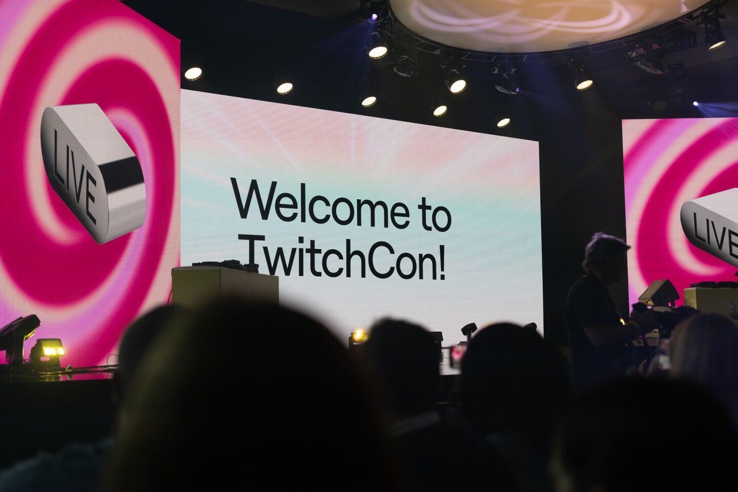 TwitchCon attendees get ready to watch the TwitchCon Opening Ceremony at the San Diego Convention Center on Oct. 17, 2025. This is the 10th year of the livestreaming convention.