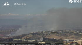 The Sorrento Fire, which has burned about 71 acres, billows smoke in the distance on Aug. 16, 2026.