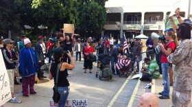 Protesters rally at an Occupy San Diego meeting in Civic Centre Plaza on Nov. 16, 2011.