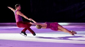 Professional skaters in performance. "In Flight: The Art Of Ice Dance International" captures the grace and artistry of ice dance, offering a front-row seat to a creative new American art form unbound by the technical rules of competitive skating.