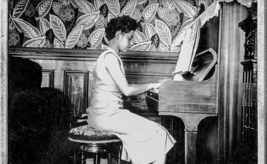 Maze plays the piano as a young woman. "The way she's touching the piano is very special," son Fabrice Maze says. "It's very rare. The way she is playing Debussy is very unique."
