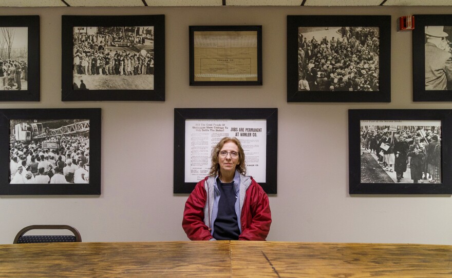 Cindy Hering, mother of Courtney Hering, sits inside the UAW Local 833 union hall in Sheboygan, Wis. She has worked in the Kohler plant for nearly 40 years.