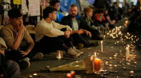 Protesters gather after the reported death of María del Carmen Abascal, the 87-year-old woman whose eviction sparked nationwide protests, in Puerta del Sol square in Madrid, Wednesday, Oct. 7, 2026.