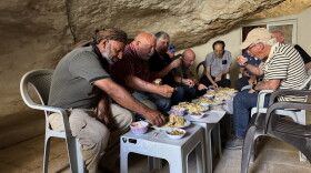 A Palestinian farmer, who was attacked by Israeli settlers, shared his story with a group of retired Israeli army generals at his home, a cave in a remote corner of the West Bank. The former military officers are speaking out against Israel's expanding settlements and frequent attacks against Palestinians.