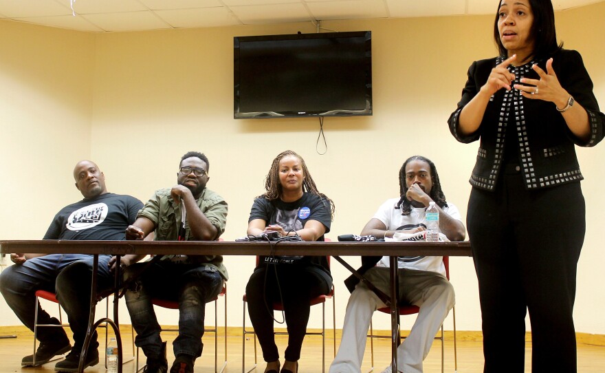 Aramis Ayala moderates a panel of community leaders at a get-out-the-vote event in a predominantly black neighborhood in Orlando, Fla.