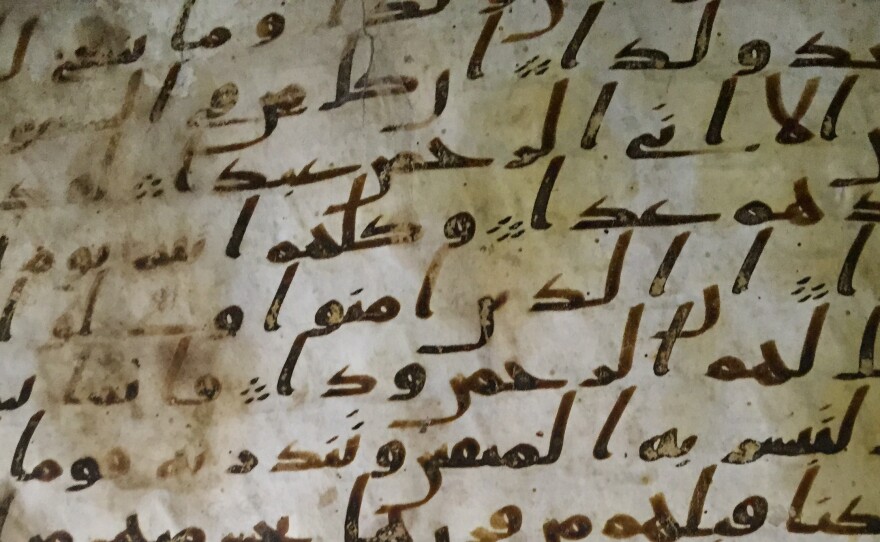 An Islamic manuscript, which has been identified as one of the world's oldest fragments of the Quran, is seen at the University of Birmingham in the U.K.
