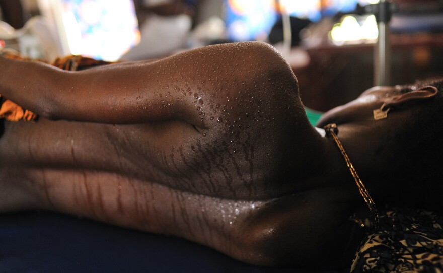 A woman in labor in the maternity ward at the Princess Christian Maternity Hospital in Freetown, Sierra Leone. With lockdowns have come fears of even greater numbers of home births.