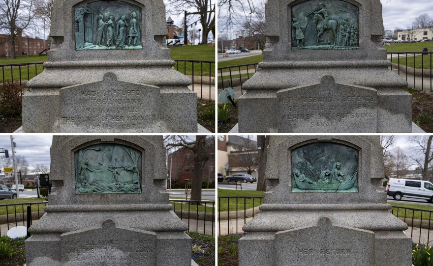 Four reliefs on the side of the statue depict the story of Hannah Duston in Haverhill, Mass.