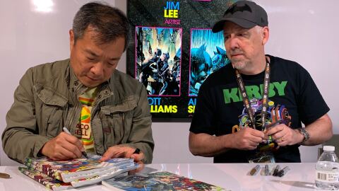 Artist and Chief Creative Officer of DC Comics Jim Lee and Inker/Colorist Scott Williams sign books at Comic-Con, July 20, 2019. 