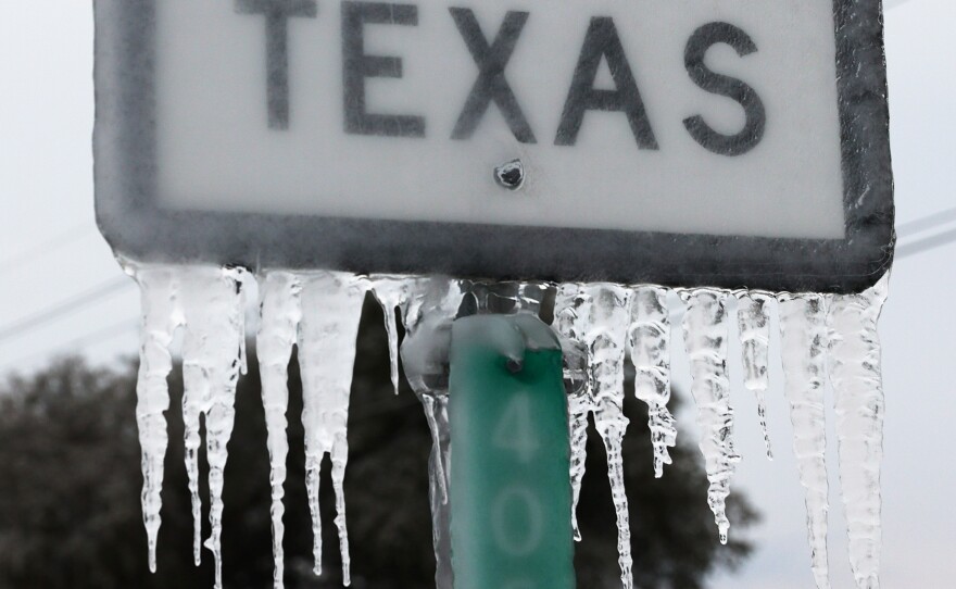 Icicles hang off the State Highway 195 sign in Feb. 2021 in Killeen, Texas.