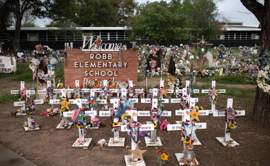 Crosses seen on Nov. 8 are set up to honor those who lost their lives during the Robb Elementary School shooting in Uvalde, Texas.