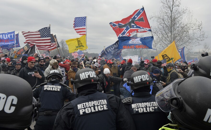 Trump supporters clash with police and security forces as they storm the U.S. Capitol.