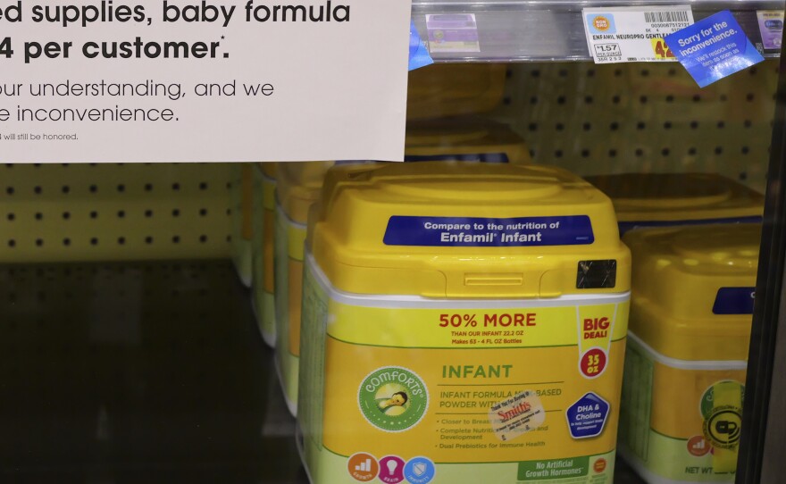 A sign tells customers of limited supplies of baby formula at a grocery store in Salt Lake City on Tuesday.