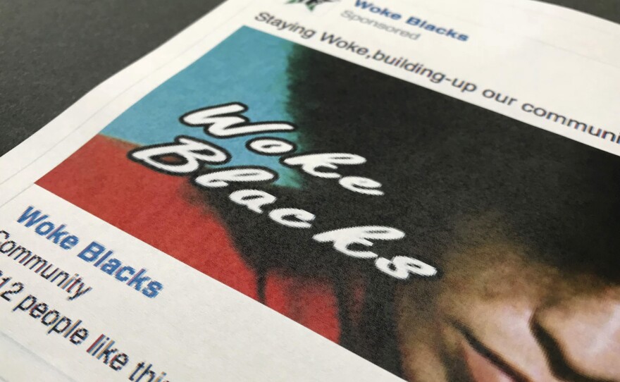 A Facebook posting, released by the House intelligence committee, for a group called "Woke Blacks" is photographed in Washington, D.C., Friday, Feb. 16, 2018.