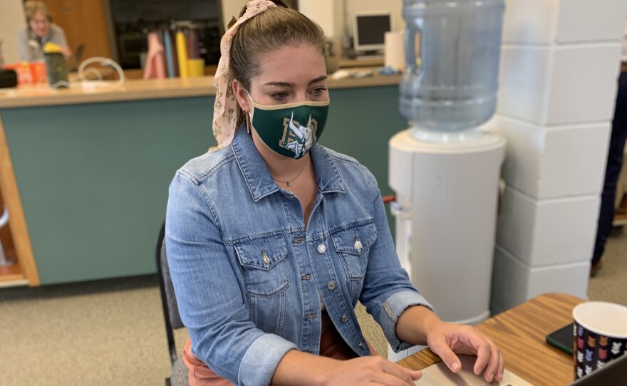Third grade teacher Maya Davis attends training before her school district reopens.