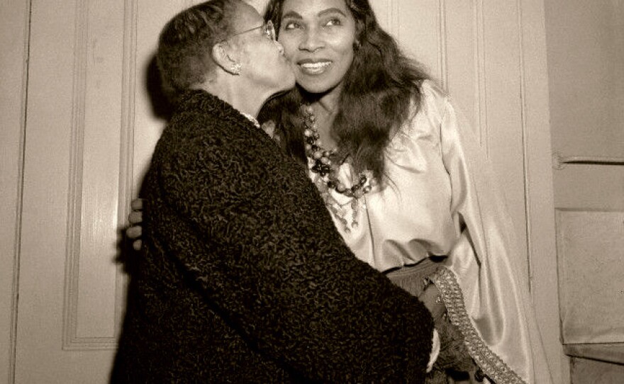 Marian Anderson's mother, Anna Anderson, kisses her after the performance of Verdi's <em>A Masked Ball</em> at the Metropolitan Opera on Jan. 7, 1955. Marian Anderson's father passed away when she was young. She dropped out of high school to help support her mother and family before returning several years later and graduating at 24.