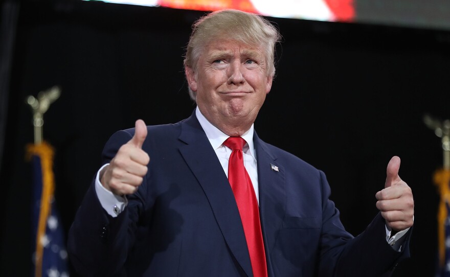 Donald Trump, at a Florida campaign rally in October, hasn't gotten a thumbs-up from the vast majority of Democrats, a reflection of the partisan divide in modern politics.