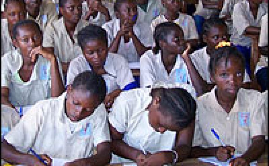 More than 100 students are squeezed into this ninth grade classroom at the Moukondo Secondary School in Brazzaville. The overcrowding is in part a result of corruption in the Congolese school administration. One-third of the country's teachers have disappeared from the system but are still drawing salaries.
