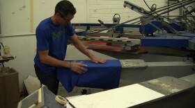 San Diego runner Mike Daly is making Boston Marathon T-shirts before the race, with proceeds going to the Challenged Athletes Foundation.