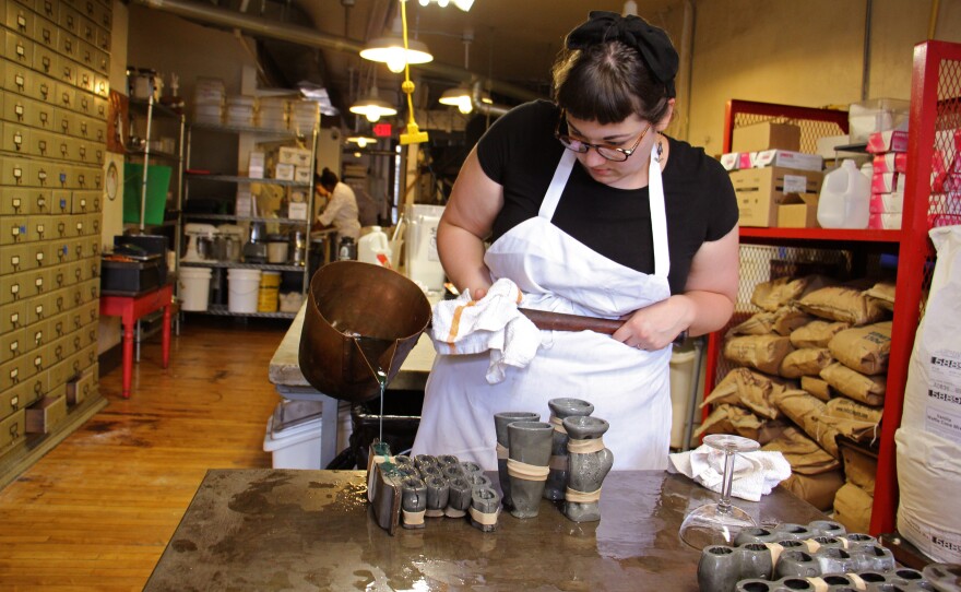 Candy maker Pavia Burroughs fills the candy molds — a mixture of donkeys, elephants and past U.S. presidents.