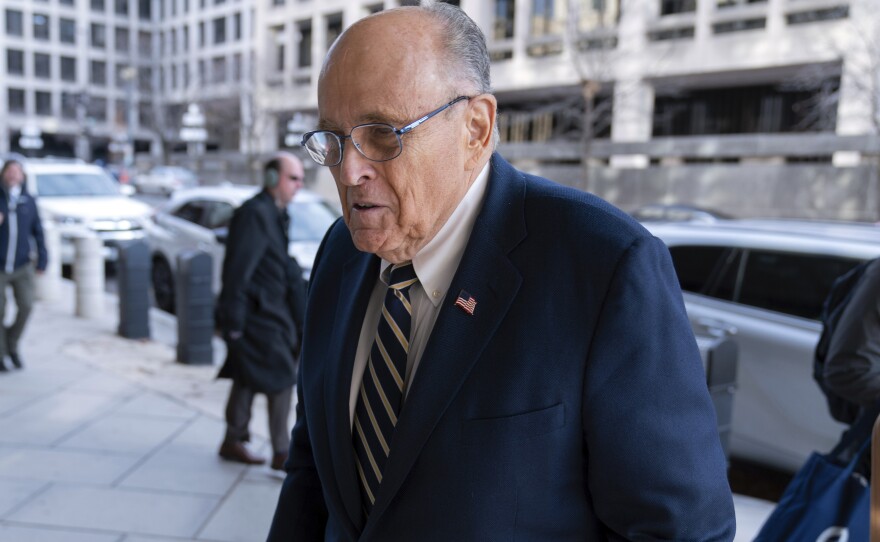 Rudy Giuliani arrives at the federal courthouse in Washington, D.C., on Wednesday for a trial to determine how much he will have to pay two 2020 Georgia election workers who he falsely accused of fraud.