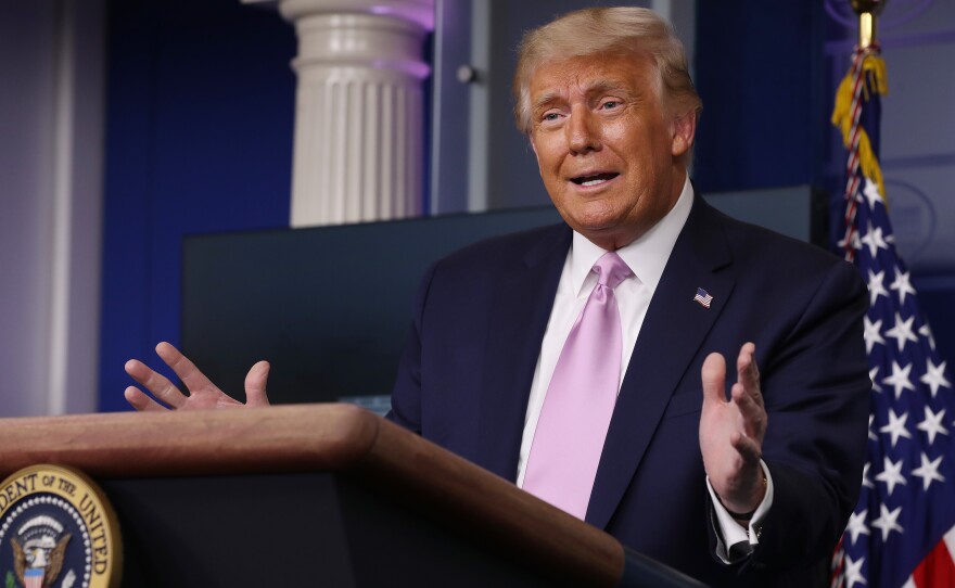 President Trump holds a press briefing at the White House on Wednesday.