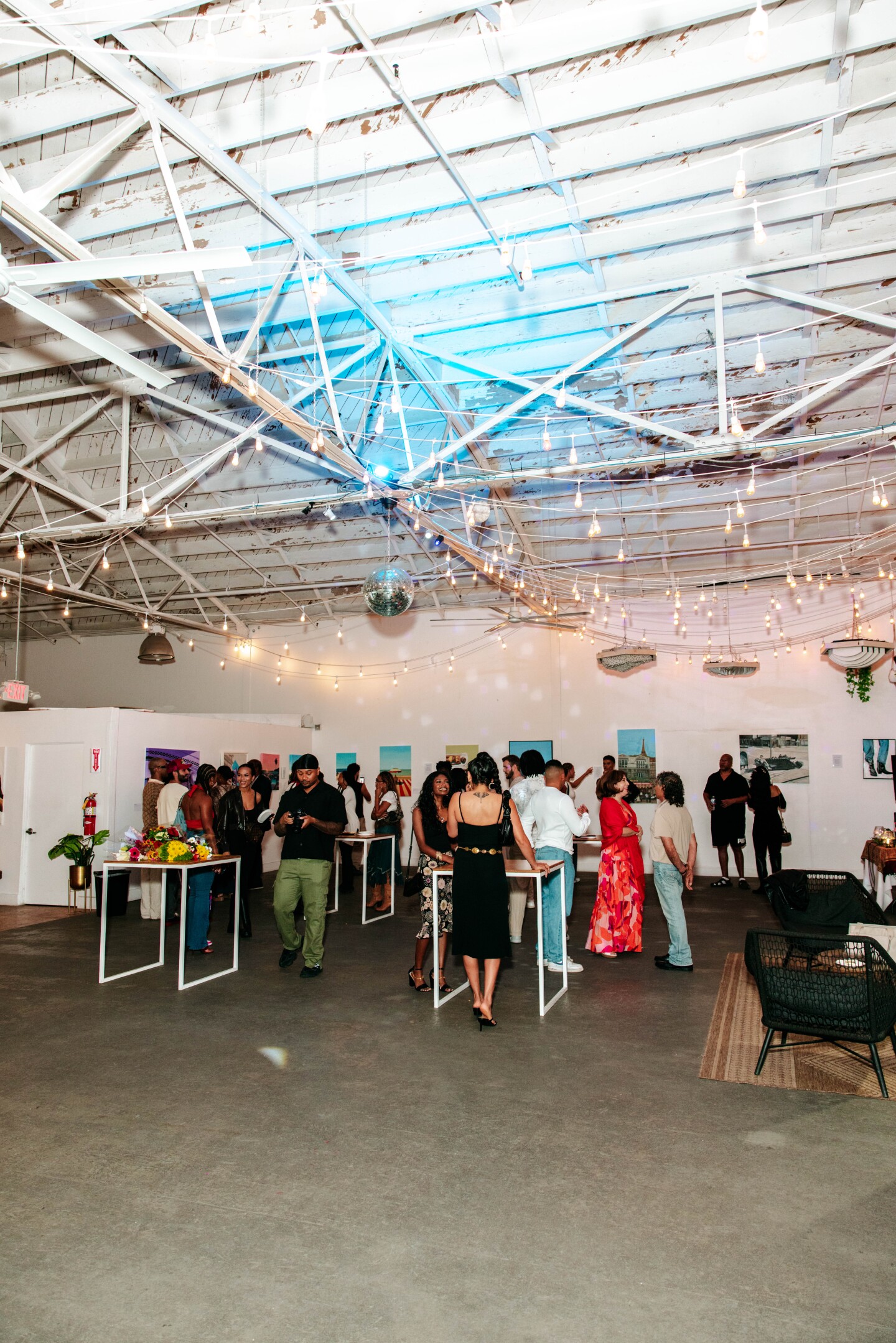 Visitors mingle around Gillis' art for his solo exhibtion in San Diego Made Factory on Sept. 28,2025