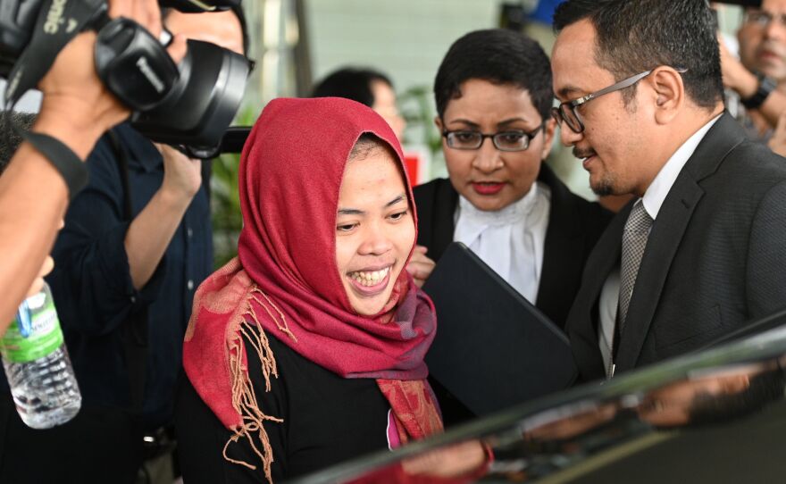 Indonesian national Siti Aisyah smiles while leaving the Shah Alam High Court, outside Kuala Lumpur on March 11.