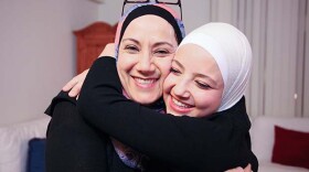 Dalya Zeno and her mother Rudayna Aksh hugging.
