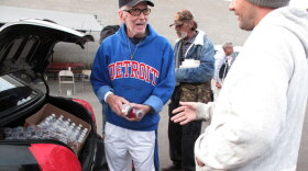 David Ross, also known as Waterman Dave, hands out bottled water and energy drinks from his trunk in San Diego. The 75-year-old retiree has made it his mission to help the homeless — even if it's just with a hug or a kind word.