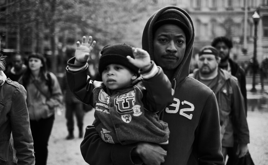 A Freddie Gray protest before Gray's passing outside of the Baltimore City Hall in Baltimore, Md., in 2015.