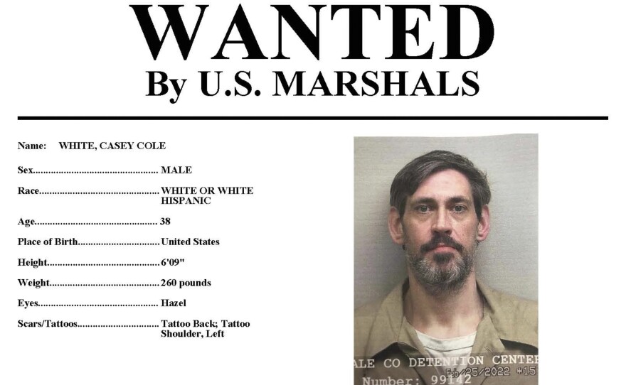 This image provided by the U.S. Marshals Service on Sunday shows part of a wanted poster for Casey White.