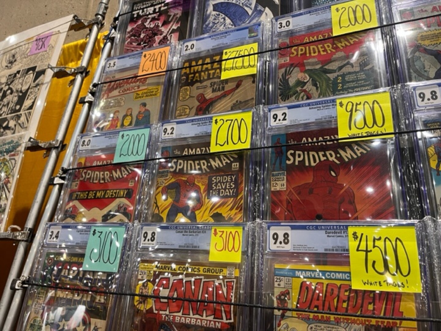 An Amazing Fantasy 15 for Spider-Man (top) is seen at the Heroes' booth on July 28, 2024. San Diego Convention Center.