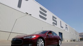 A Tesla automobile sits outside the California factory, in this undated photo.