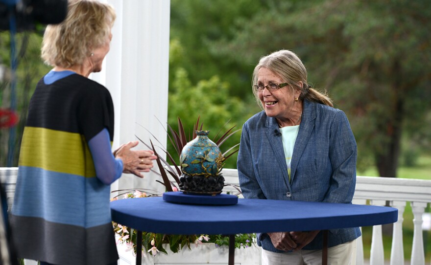 Dessa Goddard (left) appraises a Chinese cloisonné censer, ca. 1850, in Bretton Woods, N.H. on Sept. 2, 2021