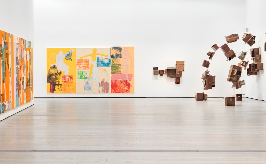 Cardboard boxes spring off the wall in Rauschenberg's <em>The 1/4 Mile.</em>