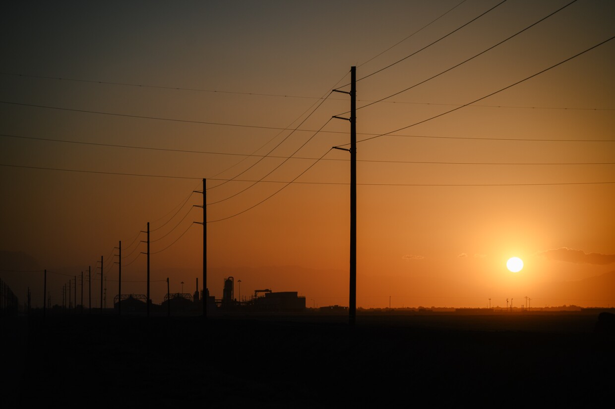 The sun sets over a geothermal power plant on April 26, 2024 near Calipatria in Imperial County.