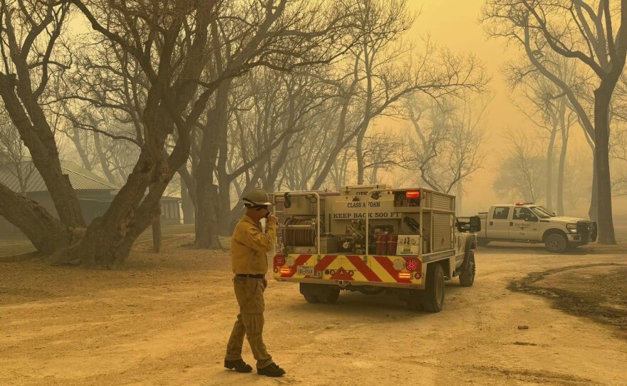 In this photo provided by the Flower Mound, Texas, Fire Department, Flower Mound firefighters respond to a fire in the Texas Panhandle, Tuesday, Feb. 27, 2024.