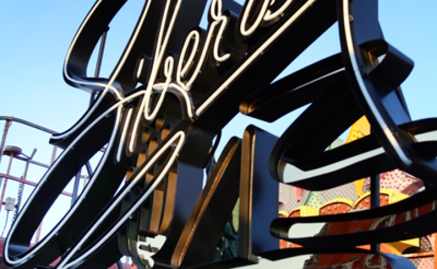 The restored Liberace sign in its new home at the Neon Museum Boneyard in Las Vegas.