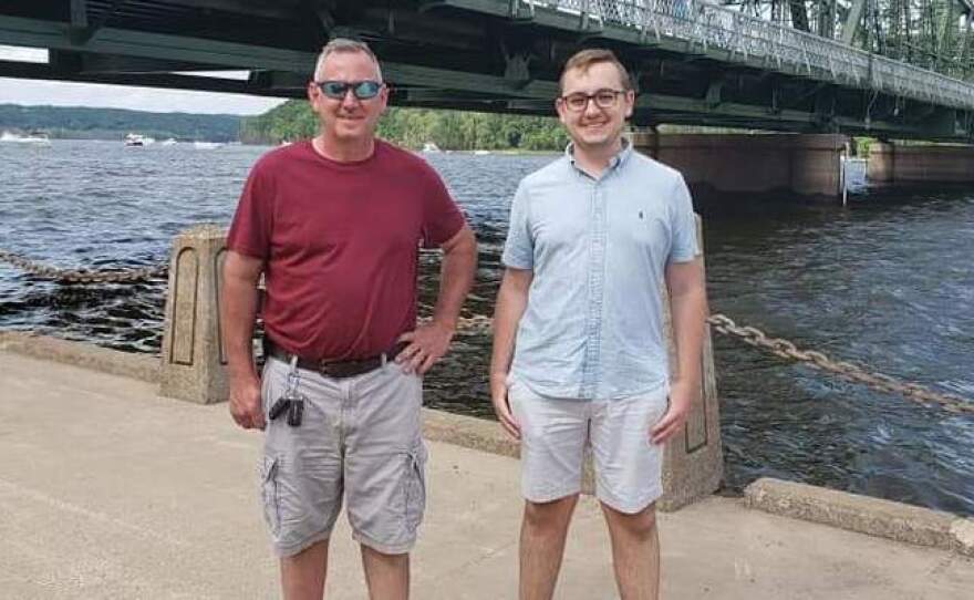 Tyler Skluzacek (right) helped develop a smartwatch app to help disrupt his father Patrick's nightmares. The app recently won approval from the Food and Drug Administration.