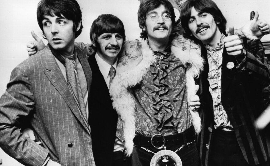 "We were able to take John's voice and get it pure through this AI," Paul McCartney says. The Beatles are seen here celebrating after finishing their album, <em>Sgt. Pepper's Lonely Hearts Club Band</em>.