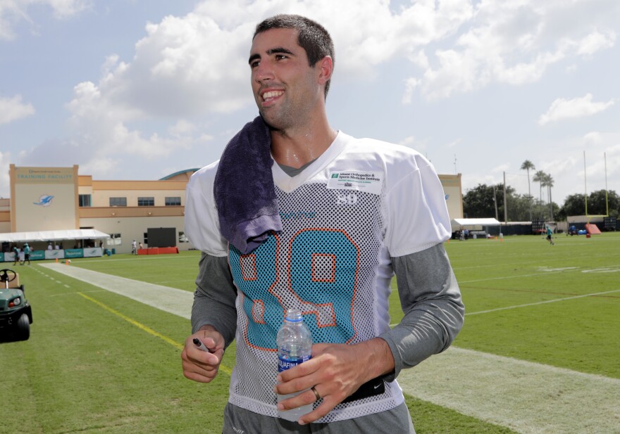 FILE - Miami Dolphins tight end Gavin Escobar walks off the field at the NFL team's training camp, July 26, 2018, in Davie, Fla. Two rock climbers, including the former NFL player, were found dead near a Southern California peak after rescue crews responded to reports of injuries, authorities said Wednesday, Sept. 29, 2022.