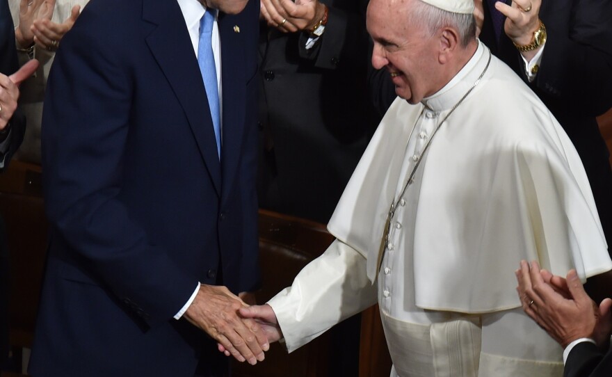 Secretary of State John Kerry's hand was one of few he shook as he arrived to address the joint meeting of Congress Thursday.