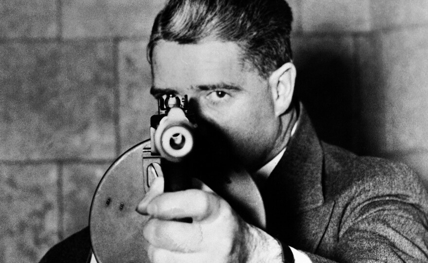 A close up of a typical "G-man" with a machine gun, as part of the Department of Justice's cooperation with the production of the the 1936 film, "You can't get away with it."