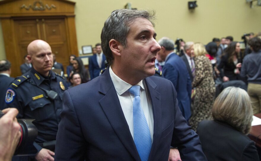 Michael Cohen, President Donald Trump's former lawyer, departs for a break in his testimony before the House Oversight and Reform Committee, on Capitol Hill, Wednesday, Feb. 27, 2019, in Washington. (AP Photo/Alex Brandon)
