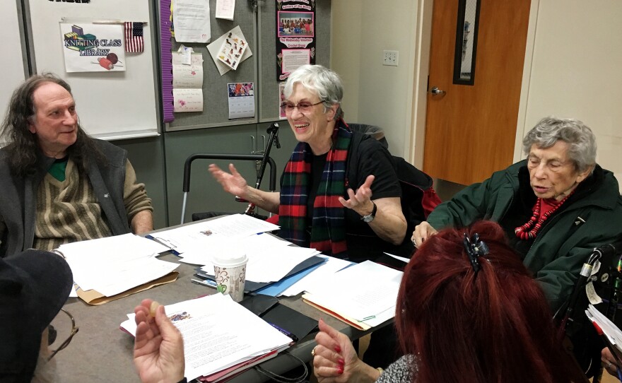 Janet Hoult (center) teaches a poetry workshop in Southern California.