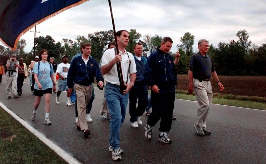In 2000, Mayor Joe Riley, right, led hundreds of marchers 120 miles to the Columbia, S.C. demanding that the Confederate flag to be removed from the top of the state Capitol.