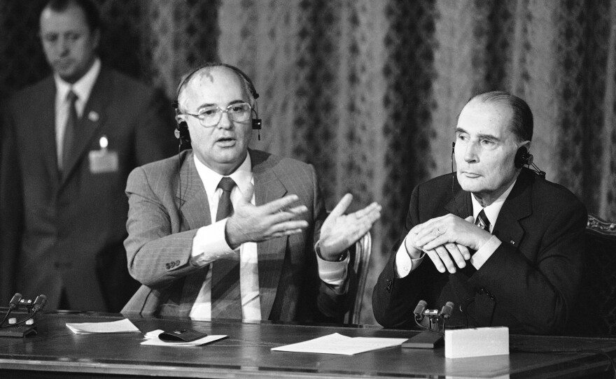 Soviet leader Mikhail Gorbachev gestures during a joint news conference with French President Francois Mitterrand who appeared to be supporting Gorbachev's proposal to the U.S. to ban weapons in space, but also rejected the Soviet leader's offer of direct disarmament talks with France at the Elysee Palace in Paris, Friday Oct. 4, 1985.
