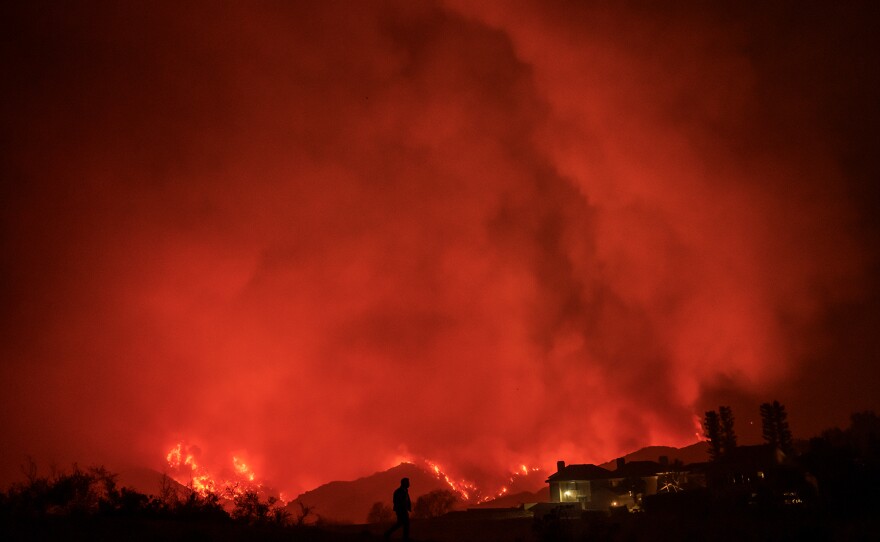 The western hills of Mandeville Canyon burning as the Palisades Fire continues to spread in Los Angeles on Jan. 10, 2025.